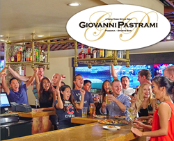Patrons cheering at the bar in Giovanni Pastrami