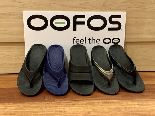 A variety of OOFOS slippers.