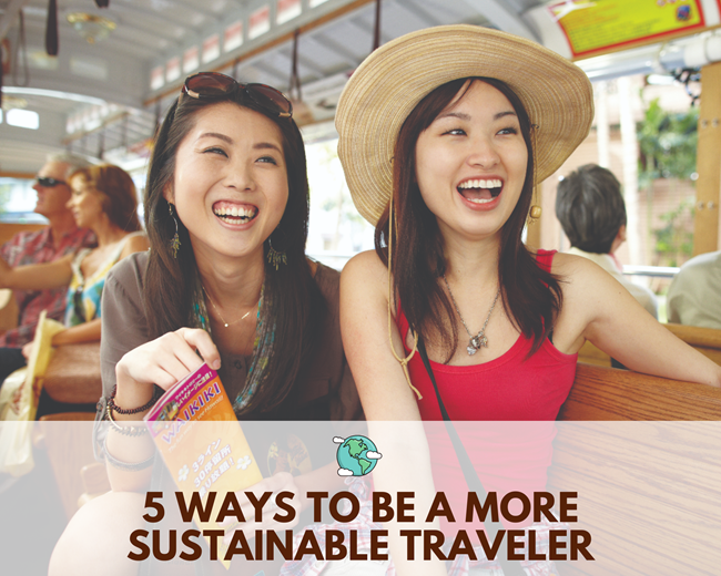 2 Asian female travelers smiling on a trolley in Waikiki