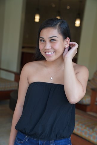Local model wearing plumeria necklace & earrings from Moana Collection island jewelry