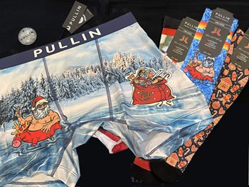 a pair of men's underwear with Santa Claus on them