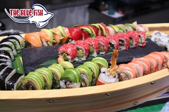 Boat of a variety of sushi rolls